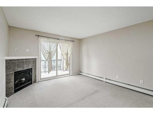 3406-60 Panatella Street Nw, Calgary, AB - Indoor With Fireplace