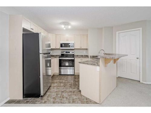 3406-60 Panatella Street Nw, Calgary, AB - Indoor Photo Showing Kitchen With Stainless Steel Kitchen