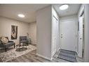 8103-304 Mackenzie Way Sw, Airdrie, AB  - Indoor 