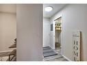 8103-304 Mackenzie Way Sw, Airdrie, AB  - Indoor Photo Showing Other Room 