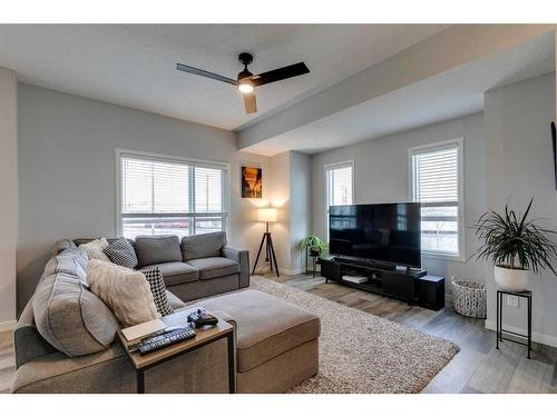 202 Harvest Grove Walk Ne, Calgary, AB - Indoor Photo Showing Living Room