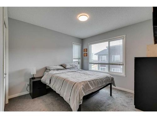 202 Harvest Grove Walk Ne, Calgary, AB - Indoor Photo Showing Bedroom