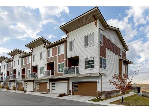 202 Harvest Grove Walk Ne, Calgary, AB - Outdoor With Balcony With Facade