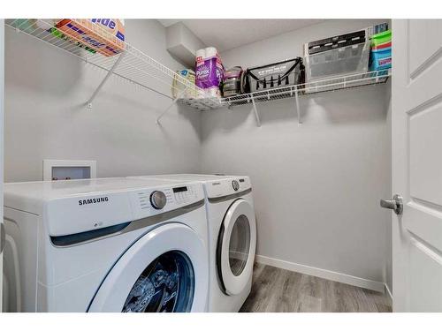 202 Harvest Grove Walk Ne, Calgary, AB - Indoor Photo Showing Laundry Room