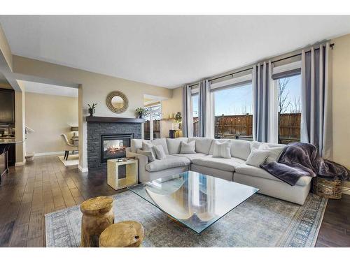 110 Ascot Crescent Sw, Calgary, AB - Indoor Photo Showing Living Room With Fireplace