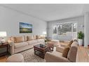 72 Doverglen Crescent Se, Calgary, AB  - Indoor Photo Showing Living Room 