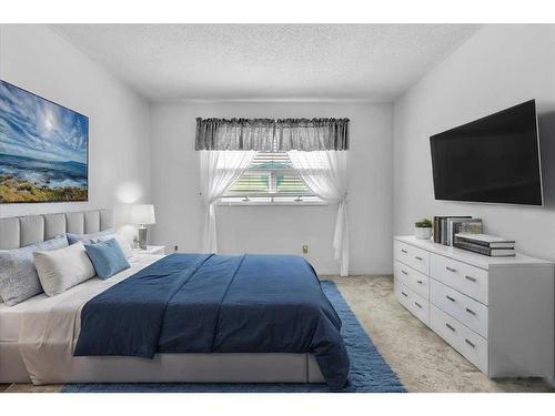 72 Doverglen Crescent Se, Calgary, AB - Indoor Photo Showing Bedroom