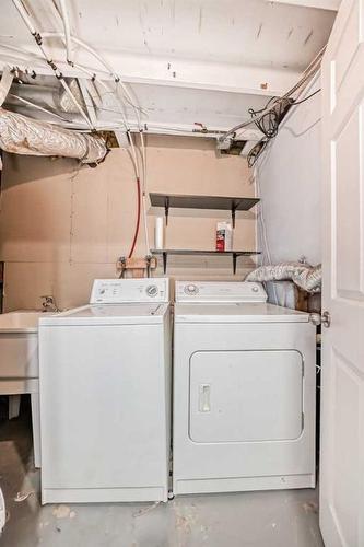 148 Castlegreen Close Ne, Calgary, AB - Indoor Photo Showing Laundry Room