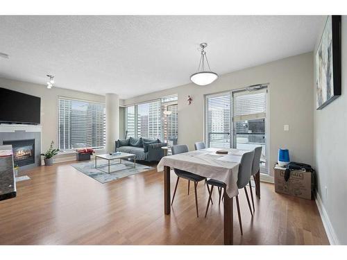 1607-910 5 Avenue Sw, Calgary, AB - Indoor With Fireplace