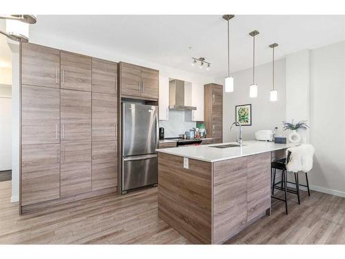 410-122 Mahogany Centre Se, Calgary, AB - Indoor Photo Showing Kitchen With Upgraded Kitchen