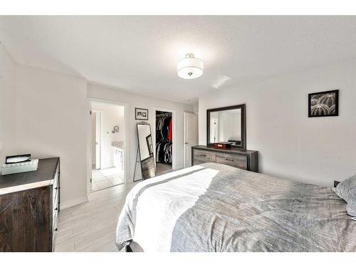 550 Bayview Way Sw, Airdrie, AB - Indoor Photo Showing Bedroom