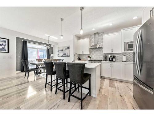 550 Bayview Way Sw, Airdrie, AB - Indoor Photo Showing Kitchen With Stainless Steel Kitchen With Upgraded Kitchen