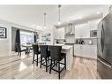 550 Bayview Way Sw, Airdrie, AB  - Indoor Photo Showing Kitchen With Stainless Steel Kitchen With Upgraded Kitchen 