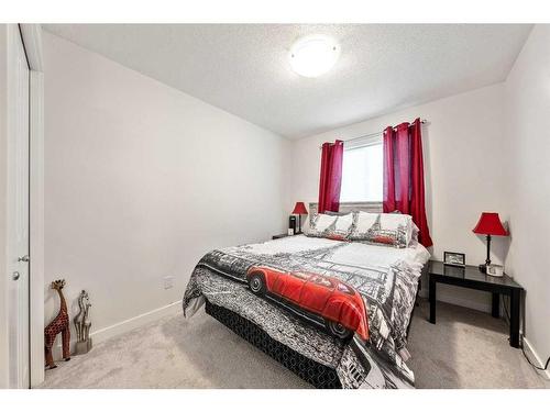 550 Bayview Way Sw, Airdrie, AB - Indoor Photo Showing Bedroom