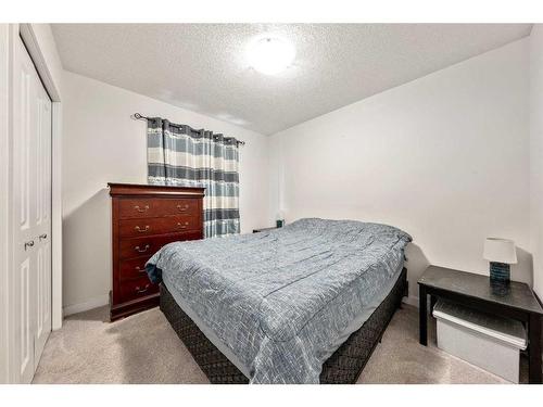 550 Bayview Way Sw, Airdrie, AB - Indoor Photo Showing Bedroom