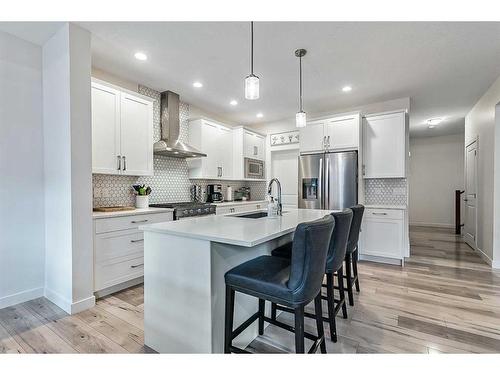 550 Bayview Way Sw, Airdrie, AB - Indoor Photo Showing Kitchen With Stainless Steel Kitchen With Upgraded Kitchen