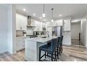 550 Bayview Way Sw, Airdrie, AB  - Indoor Photo Showing Kitchen With Stainless Steel Kitchen With Upgraded Kitchen 