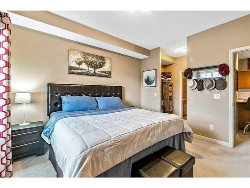 3401-92 Crystal Shores Road, Okotoks, AB - Indoor Photo Showing Bedroom