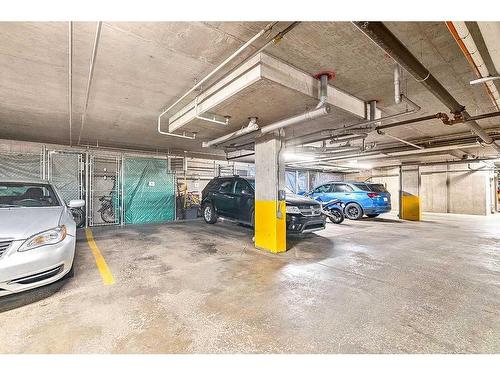 3401-92 Crystal Shores Road, Okotoks, AB - Indoor Photo Showing Garage