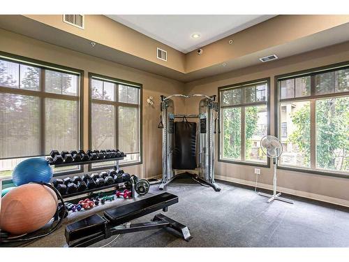 3401-92 Crystal Shores Road, Okotoks, AB - Indoor Photo Showing Gym Room