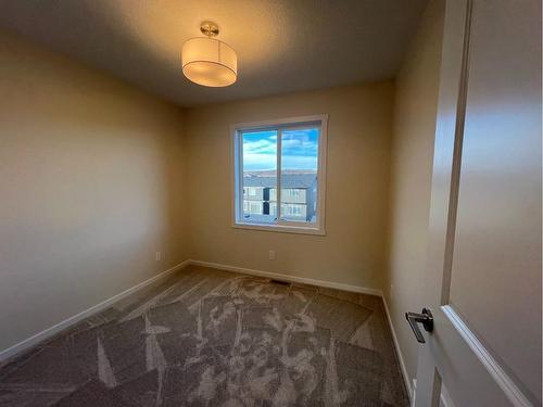 101 Riversong Boulevard, Cochrane, AB - Indoor Photo Showing Other Room