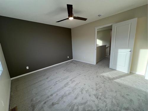 101 Riversong Boulevard, Cochrane, AB - Indoor Photo Showing Other Room