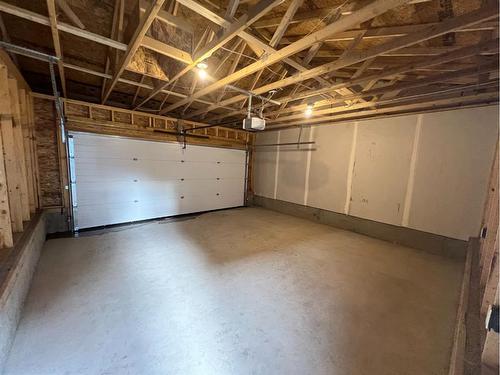 101 Riversong Boulevard, Cochrane, AB - Indoor Photo Showing Garage