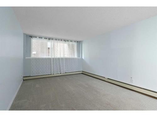 108-3420 50 Street Nw, Calgary, AB - Indoor Photo Showing Other Room