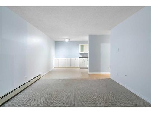 108-3420 50 Street Nw, Calgary, AB - Indoor Photo Showing Other Room