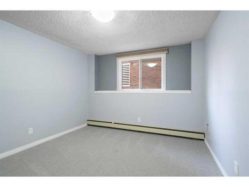 108-3420 50 Street Nw, Calgary, AB - Indoor Photo Showing Other Room