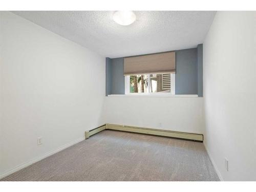 108-3420 50 Street Nw, Calgary, AB - Indoor Photo Showing Other Room