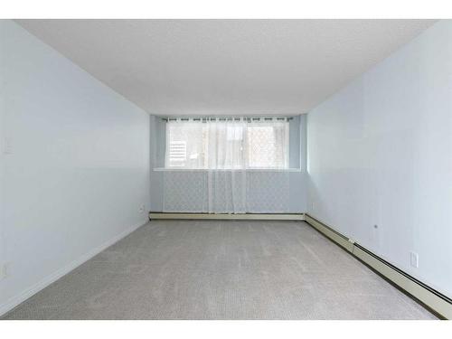 108-3420 50 Street Nw, Calgary, AB - Indoor Photo Showing Other Room