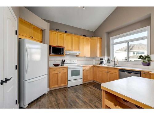 129 Mt Douglas Green Se, Calgary, AB - Indoor Photo Showing Kitchen With Double Sink