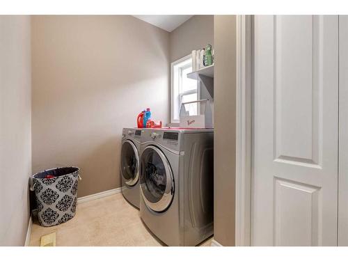 129 Mt Douglas Green Se, Calgary, AB - Indoor Photo Showing Laundry Room