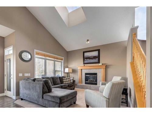 129 Mt Douglas Green Se, Calgary, AB - Indoor Photo Showing Living Room With Fireplace