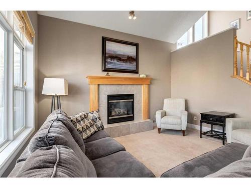 129 Mt Douglas Green Se, Calgary, AB - Indoor Photo Showing Living Room With Fireplace