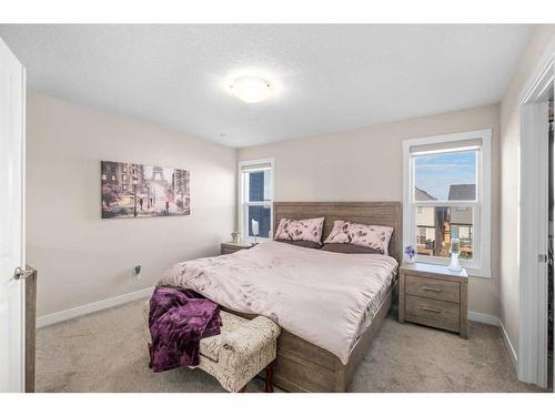 23 Cranbrook Gardens Se, Calgary, AB - Indoor Photo Showing Bedroom