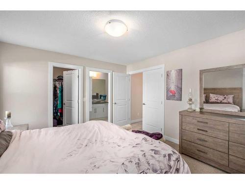 23 Cranbrook Gardens Se, Calgary, AB - Indoor Photo Showing Bedroom