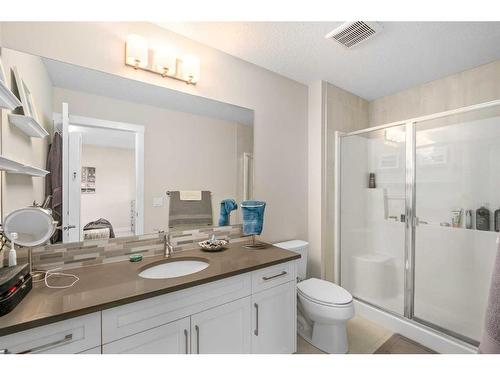 23 Cranbrook Gardens Se, Calgary, AB - Indoor Photo Showing Bathroom