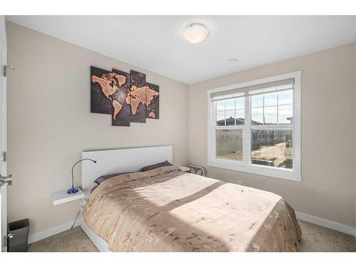 23 Cranbrook Gardens Se, Calgary, AB - Indoor Photo Showing Bedroom