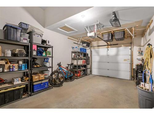 23 Cranbrook Gardens Se, Calgary, AB - Indoor Photo Showing Garage