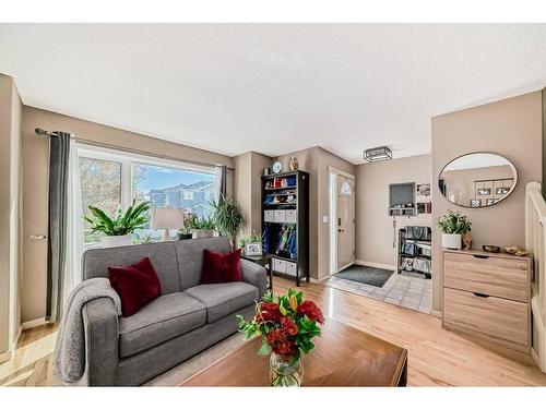 115 Silverado Range Close Sw, Calgary, AB - Indoor Photo Showing Living Room