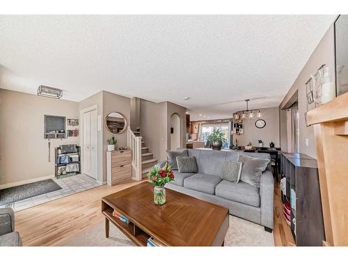 115 Silverado Range Close Sw, Calgary, AB - Indoor Photo Showing Living Room