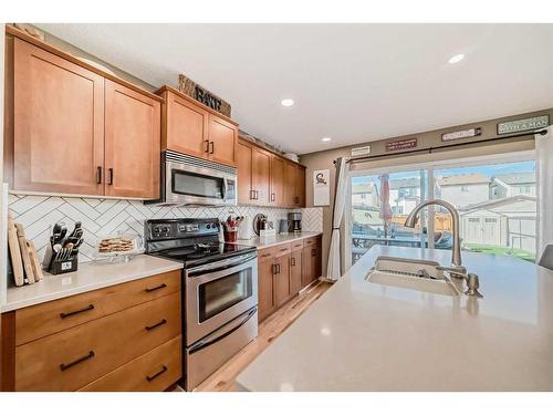 115 Silverado Range Close Sw, Calgary, AB - Indoor Photo Showing Kitchen