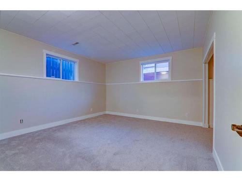 67 Cimarron Drive, Okotoks, AB - Indoor Photo Showing Other Room