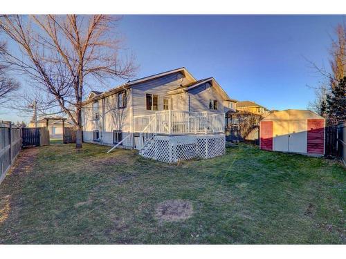 67 Cimarron Drive, Okotoks, AB - Outdoor With Deck Patio Veranda