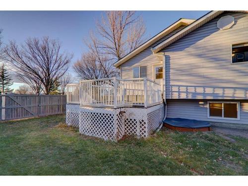 67 Cimarron Drive, Okotoks, AB - Outdoor With Deck Patio Veranda