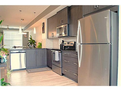 95 Legacy View Se, Calgary, AB - Indoor Photo Showing Kitchen With Stainless Steel Kitchen