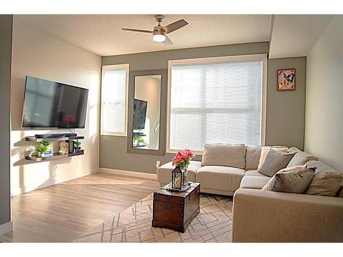 95 Legacy View Se, Calgary, AB - Indoor Photo Showing Living Room