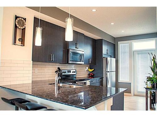 95 Legacy View Se, Calgary, AB - Indoor Photo Showing Kitchen With Stainless Steel Kitchen With Upgraded Kitchen